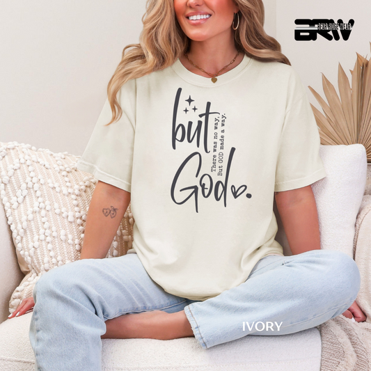 Woman wearing a white t-shirt with text sitting on a couch.
