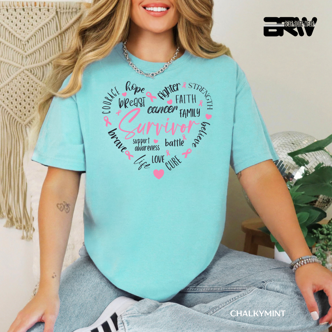Person wearing a light blue t-shirt with motivational phrases on it, sitting in a casual setting.